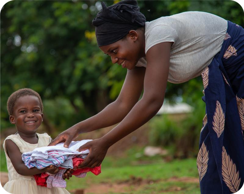 Mother giving gift to her daughter