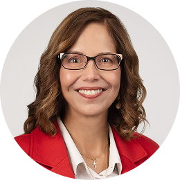 A headshot of Suzanne VanSligtenhorst