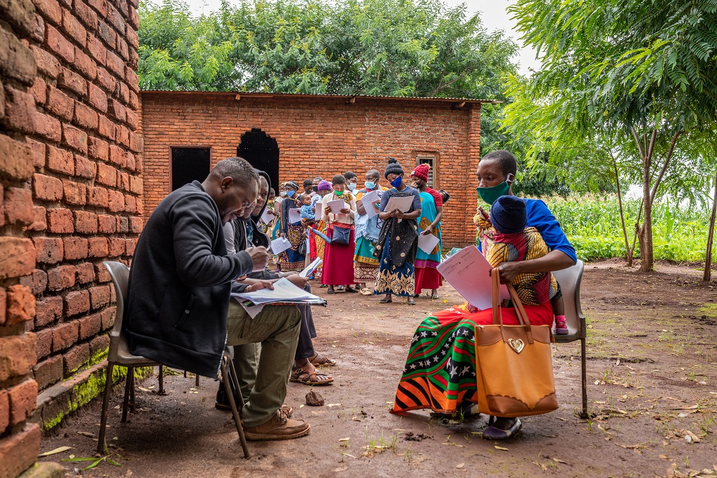 Women in queue for healthcare registration