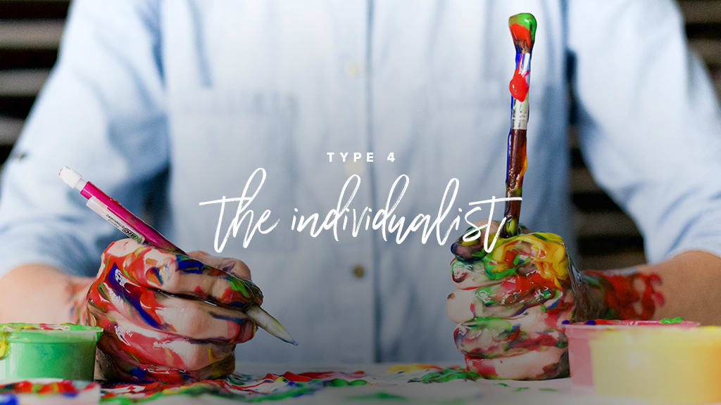 "type 4: the individualist" a man with a bottom up shirt is holdsa paint brush and a pencil with his hands covered in paint.