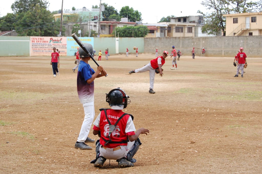 Boys playing baseball on a baseball diamond