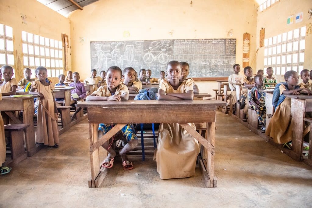 Children seated in a classroom