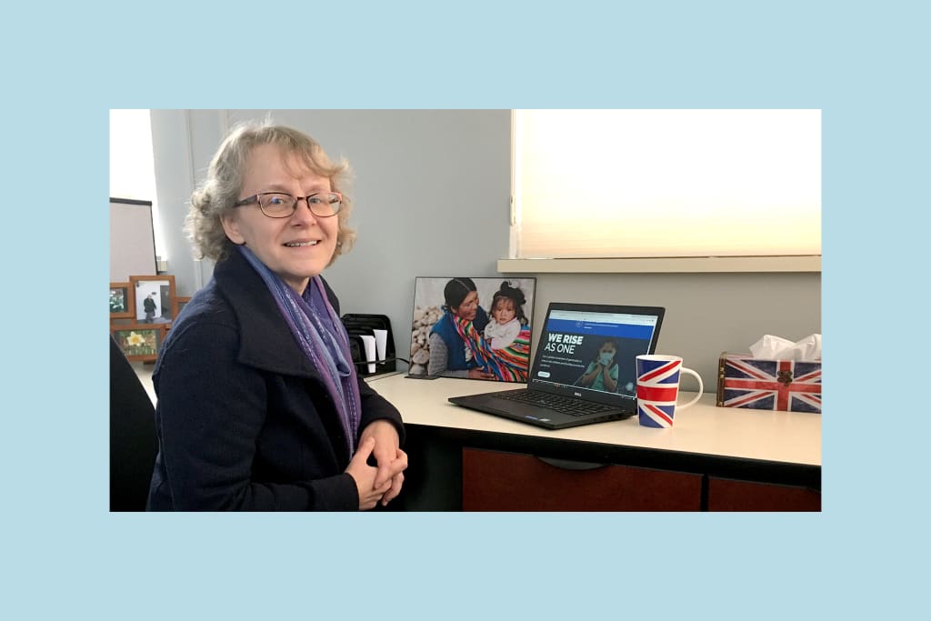 Sarah sits at her desk at the Compassion office in London, Ontario.