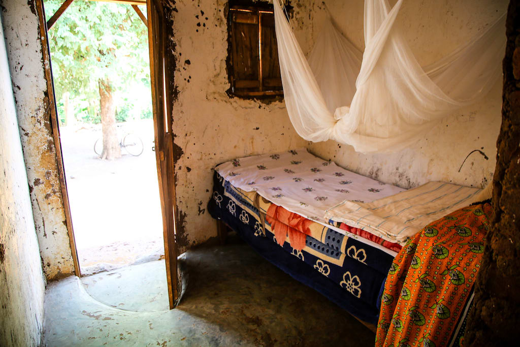 A picture of their old home, with one matress