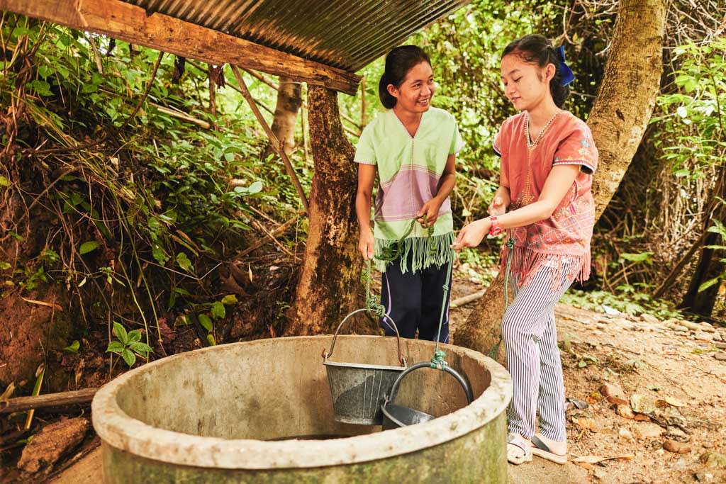 These girls, who live in northwestern Thailand on the border of Myanmar, come to this community well each day to get water for washing, cooking and drinking. An improved water source like a well can drastically reduce water-borne diseases compared to gathering water from a river or stream that animals frequent.