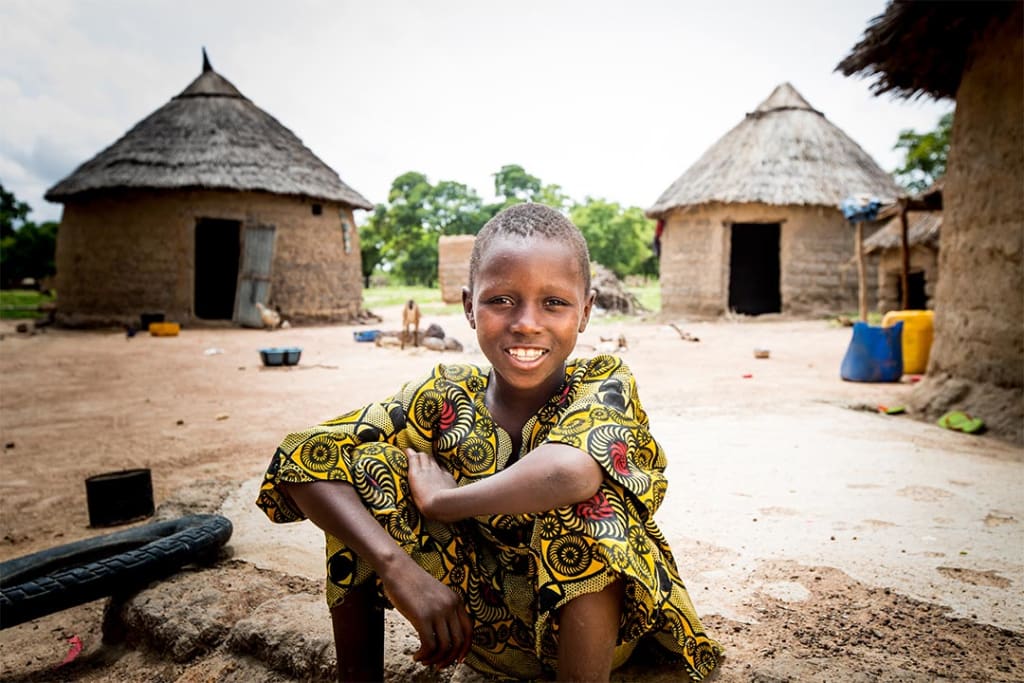 A boy in Burkina Faso at his family’s compound