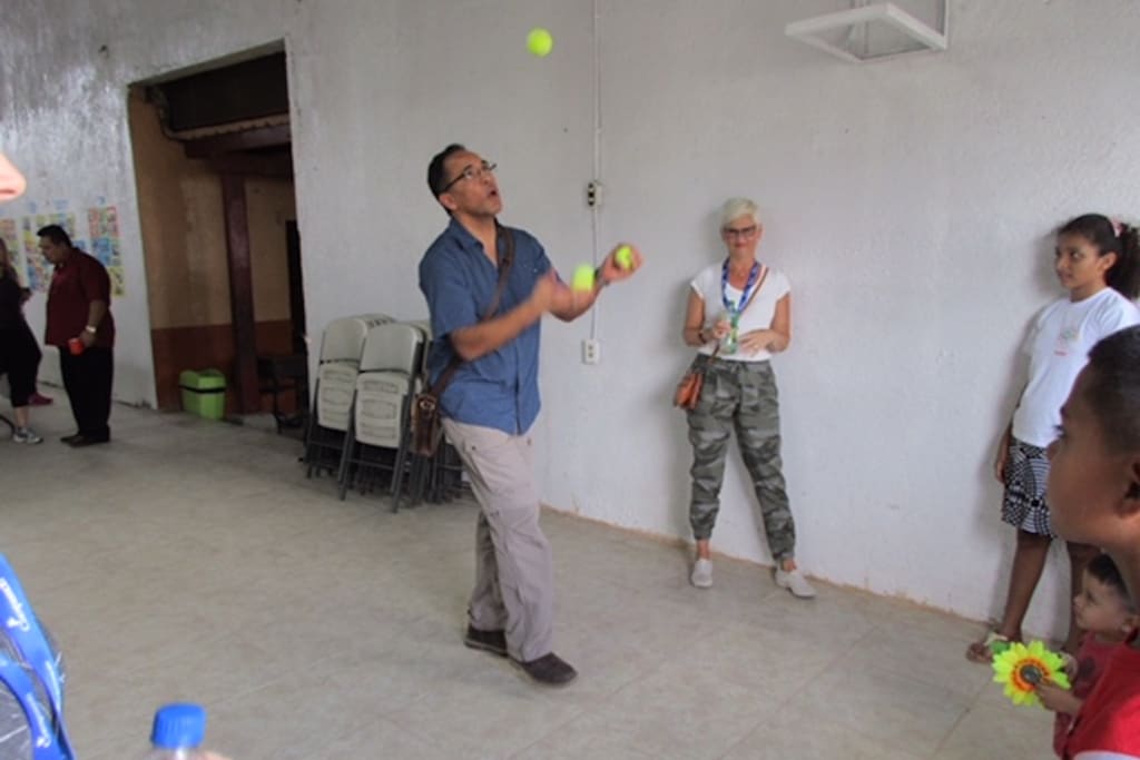Tim Hague Sr. shows off some juggling skills while travelling with Compassion.