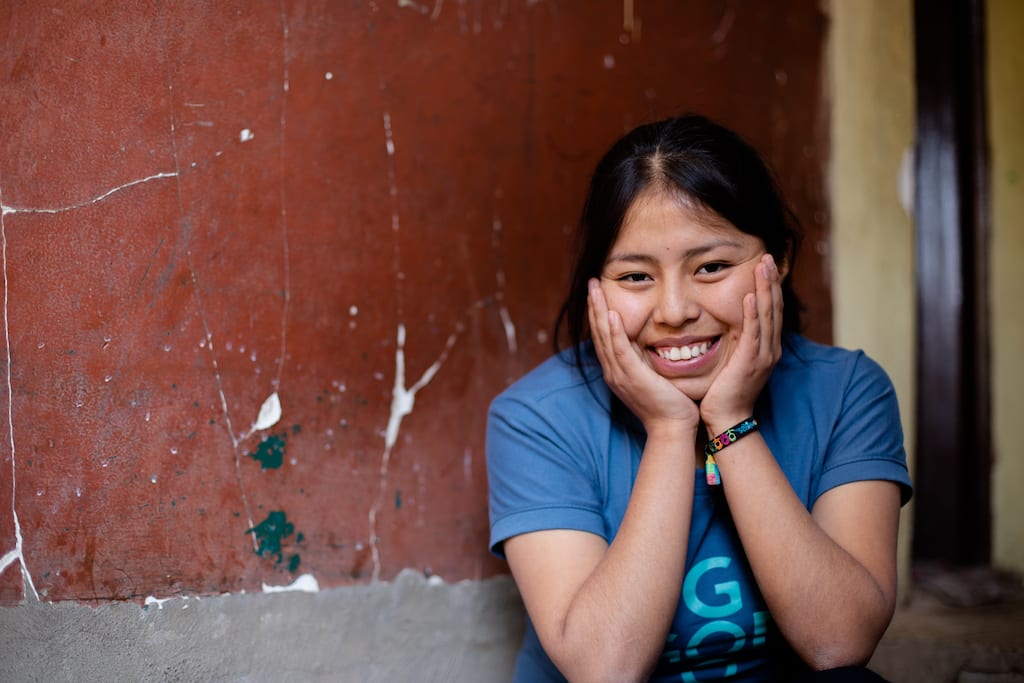 A smiling Bolivian teenager.
