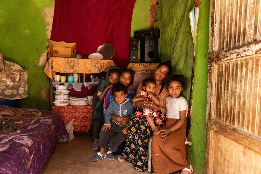Single mother, Abiyot, in her home with 5 of her 6 children.