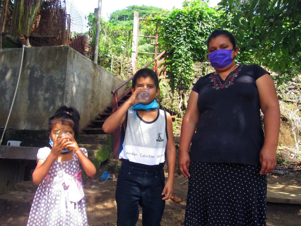 Petrona and two of her children.