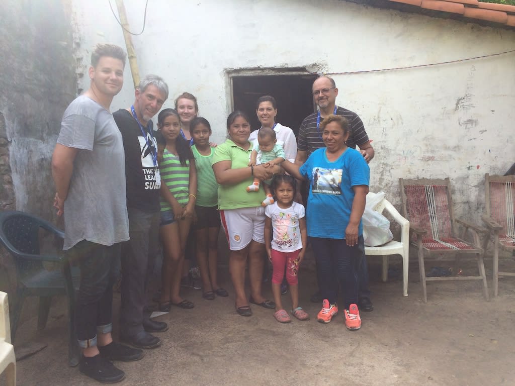 A group of Canadians visit the home of a Compassion beneficiary in Boliva.