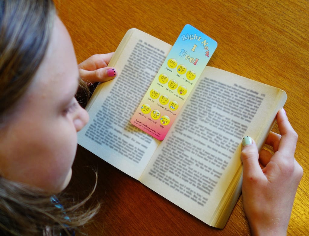 Eowyn reads a book using "The Emotional Bookmark".