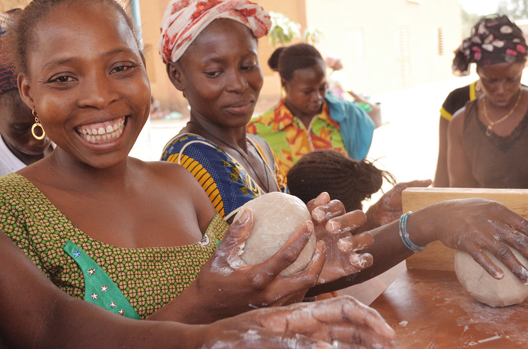 Close-up of adult women and their hands, forming and molding, rolling and washing, cleaning, scrubbing their hands using the soap they have made in class, learning valuable vocational and educational skills.