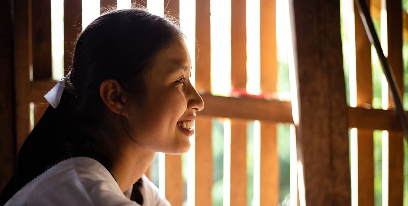 A thai young lady smiling confidently
