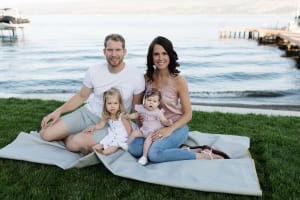 James and April Reimer in a family portrait with their daughters