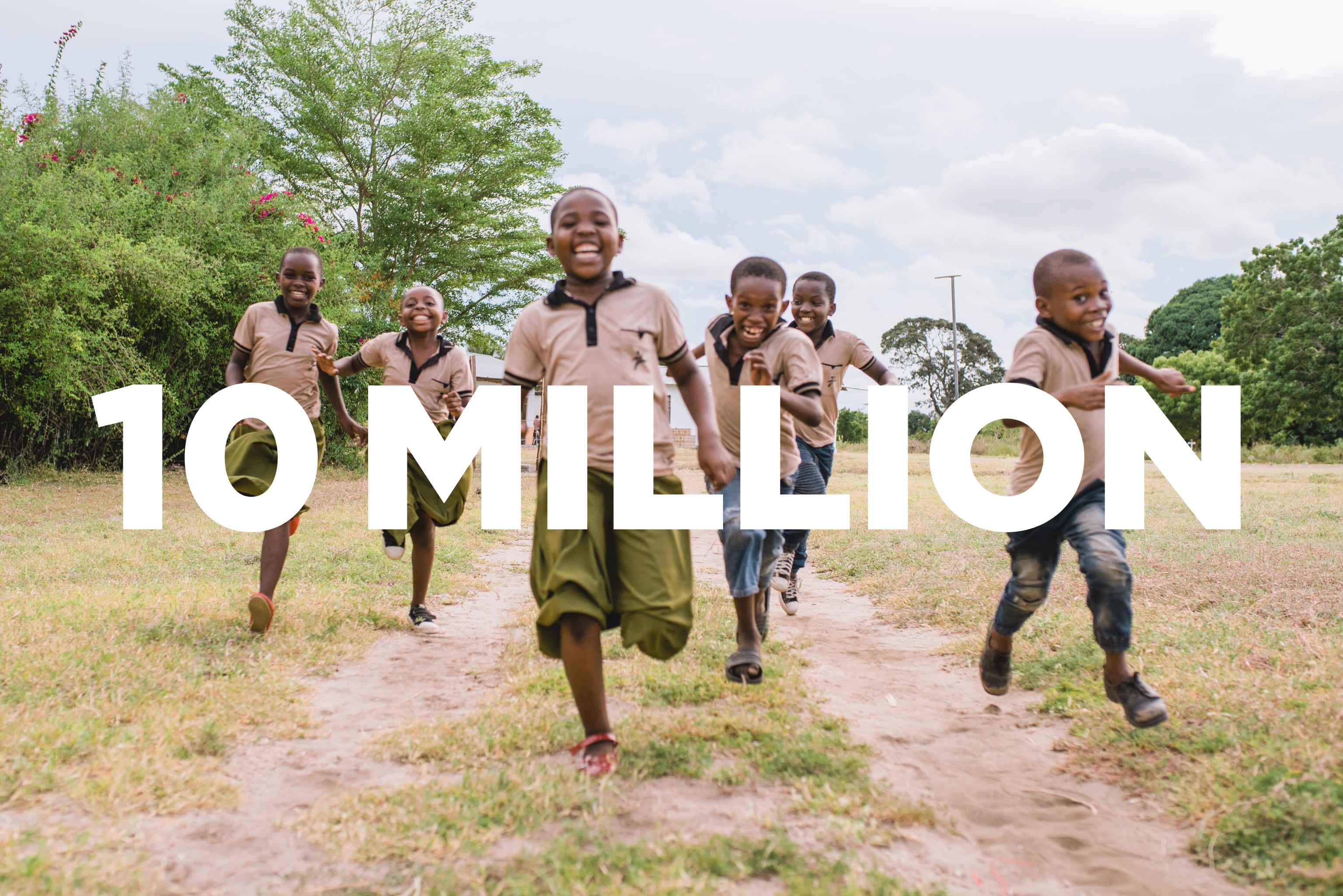 A group of children running with the words "10 million" on the image.