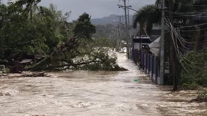 Floodwaters fill a street