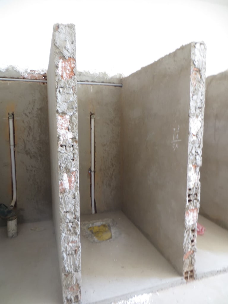 The concrete frame of the girls bathroom.