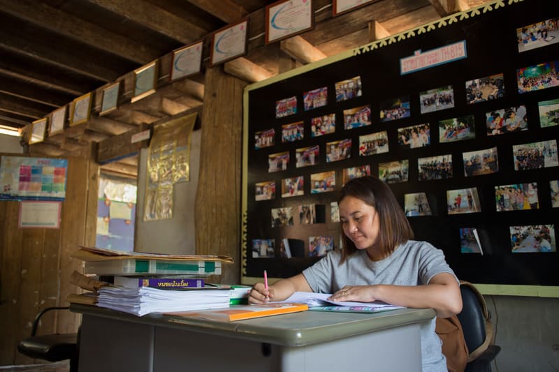 Gai working as an accountant at the Compassion centre